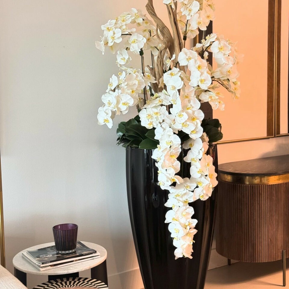 San Jose Vase in glossy black with hanging yellow orchids – The Ever Botanic