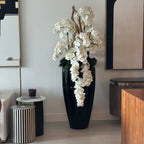 San Jose Vase in glossy black with hanging yellow orchids – The Ever Botanic